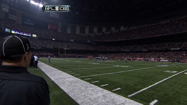 VIDEO: Power outage leaves biggest football game of the year in the dark for about half an hour.