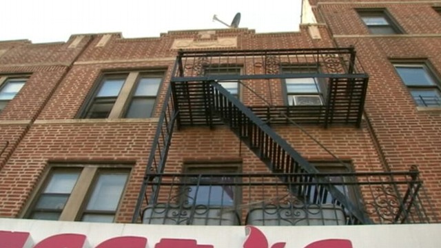 VIDEO: Christina Torre, 44, prevented the one-year-old from hitting pavement after tumble from fire escape.