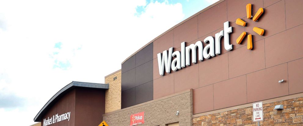 PHOTO: People walk in and out of a Walmart store, in Dallas, on Aug. 26, 2016.