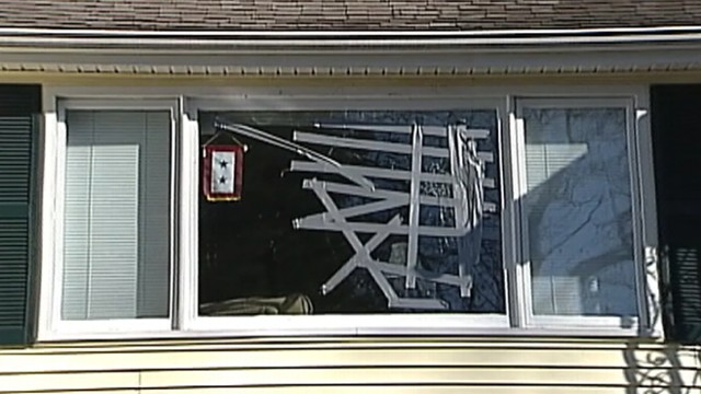 VIDEO: Massachusetts homeowners unwelcomed guest ruined his living room window.