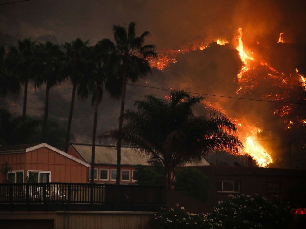 PHOTO: A wildfire threatens homes as it burns along a hillside in La Conchita, Calif., Dec. 7, 2017. 