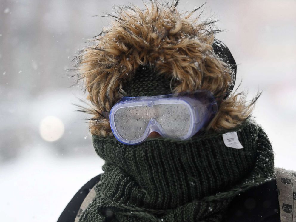 PHOTO: A woman wearing googles walks through the snow, Jan. 4, 2018 in Brooklyn, New York.