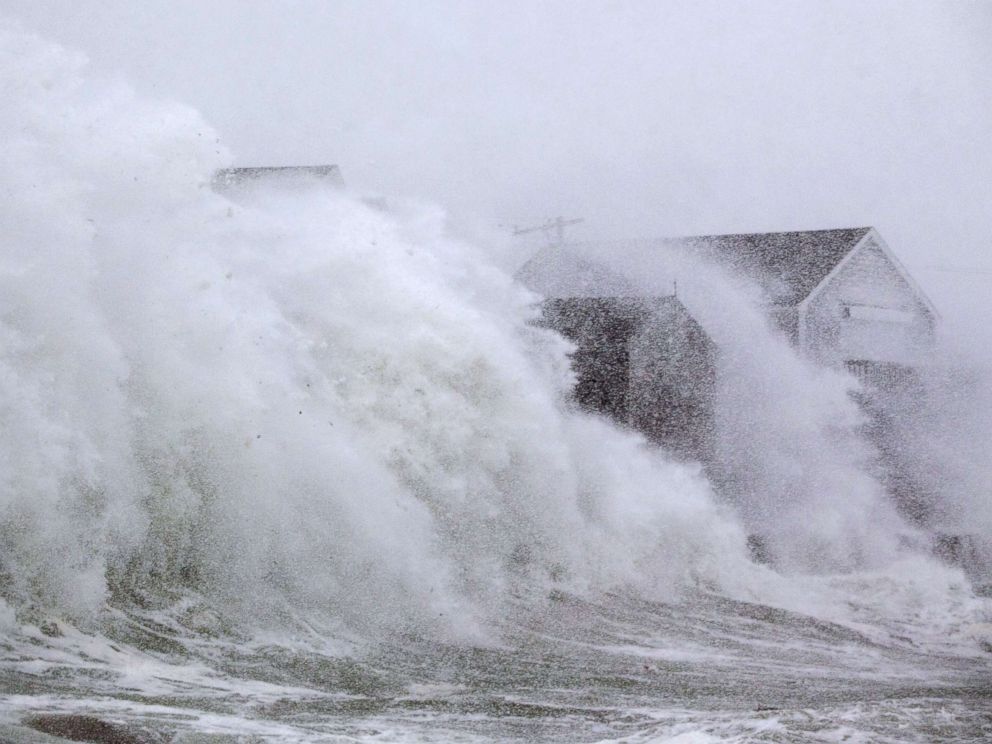 PHOTO: A wave crashes over a homes on Lighthouse Rd. as a massive winter storm begins to bear down on the region, Jan. 4, 2018 in Scituate, Mass. The bomb cyclone was expected to dump heavy snows in New England as the storm moved up the east coast.