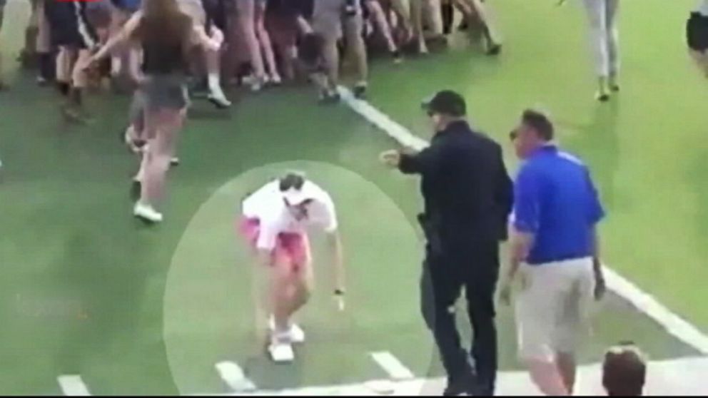 VIDEO: The incident at a high school game resulted in the Georgetown, Tex., officer being placed on leave.