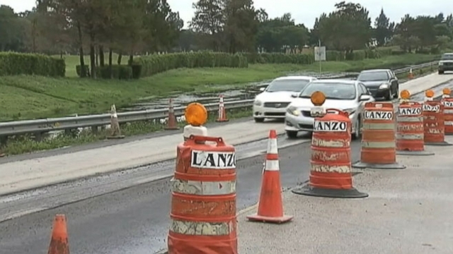 Archaeologists unearth womans bones discovered by crews doing road work in Davie, Fla.