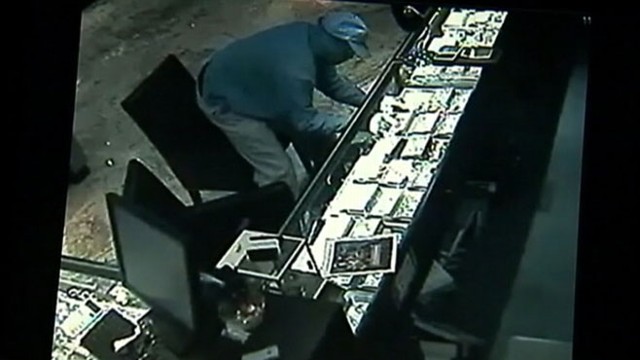 VIDEO: Three masked men made off with the stolen goods in just over one minute.