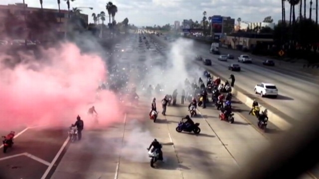 VIDEO: Dozens of motorcyclists shut down a Los Angeles freeway for the marriage proposal.