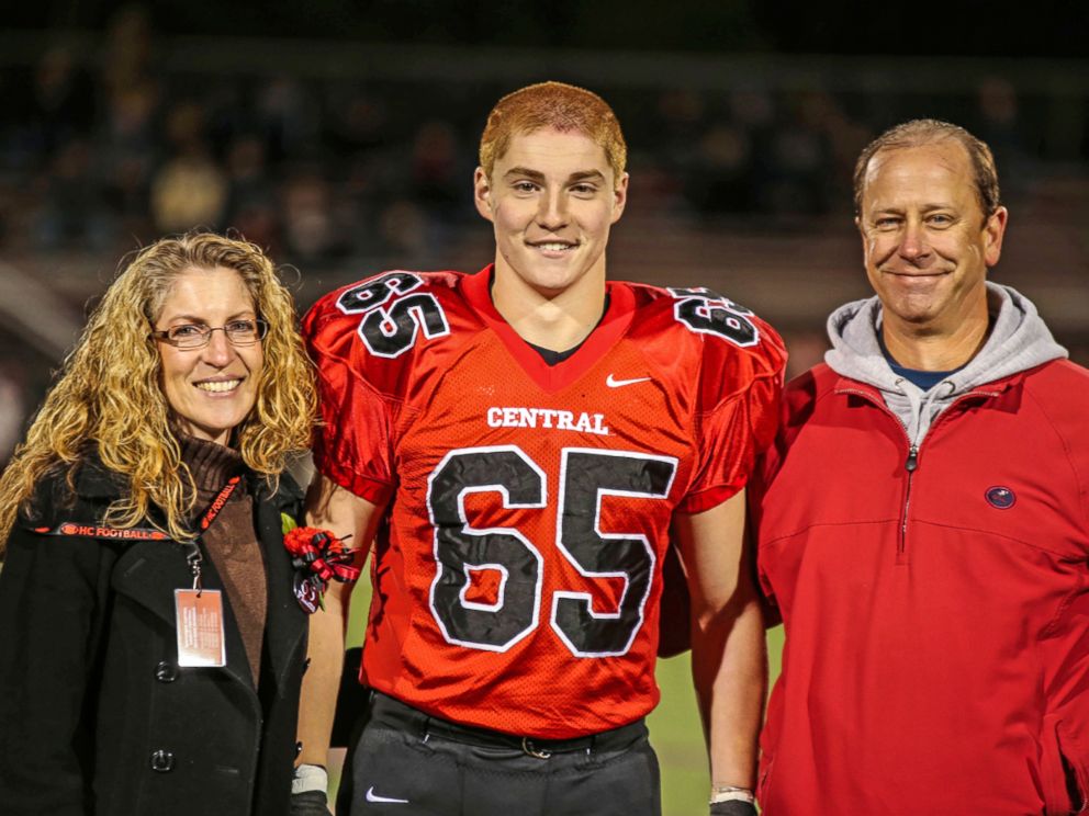 PHOTO: This Oct. 31, 2014, photo provided by Patrick Carns shows Timothy Piazza, center, with his parents Evelyn Piazza and James Piazza, during Hunterdon Central Regional High School footballs Senior Night, in Flemington, N.J. 