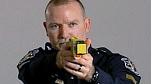 Photo: Powerful New Tasers Creating Controversy Following Recent Deaths. Weapons Carry Three Times the Sting; Prompt Safety Questions