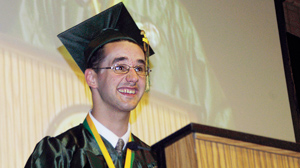 PHOTO Eric Duquette delivers his graduation speech to classmates from Smithfield High School in Rhode Island.