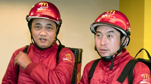 PHOTO Two McDonald?s delivery workers are shown in Shanghai, China, Nov. 15, 2010.