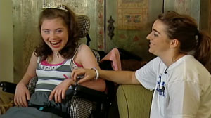 Gracie Kiltz, left, who suffered brain damage during chemotherapy for leukemia when she was 2 years old, was named homecoming queen at her Austin, Texas, high school.