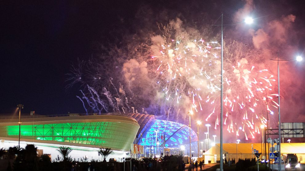 PHOTO: Fireworks are shot over Fisht Olympic Stadium, right, and Adler Arena, left, at the conclusion of a rehearsal for the opening ceremony at the 2014 Winter Olympics, Saturday, Feb. 1, 2014, in Sochi, Russia.