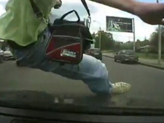Watch: Man Gets Hit By Car and Survives