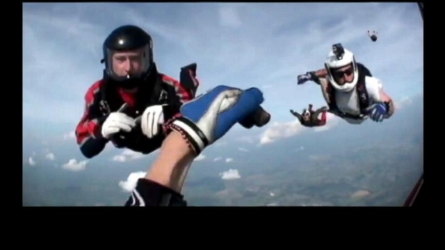 VIDEO: Mid-air rescue at 12,000 feet saves a skydiver whose chute did not open.