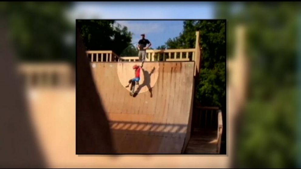 Father Coaching His Child Appears to Kick Son Down Ramp in Skate Park