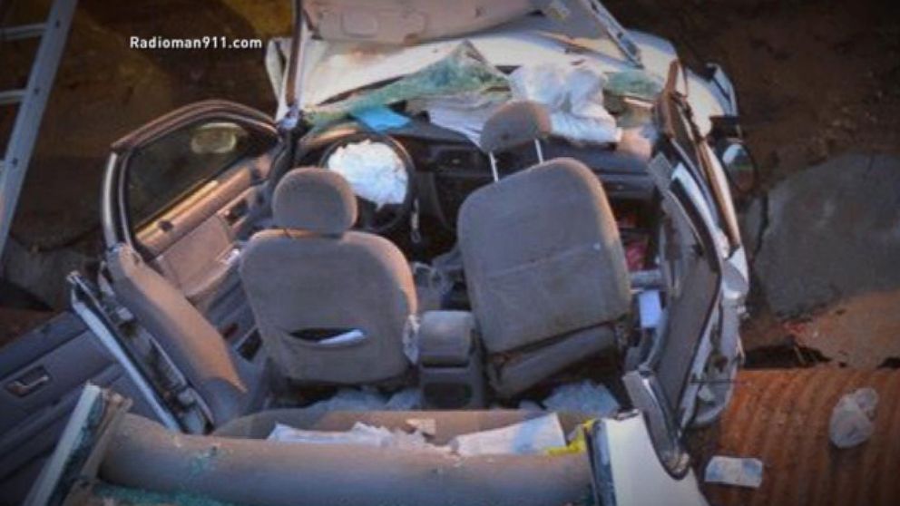 VIDEO: 911 Call: Mother and Son Drive Into a Sink Hole