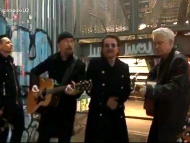 WATCH: U2 performs a surprise pop-up concert on NYC street corner
