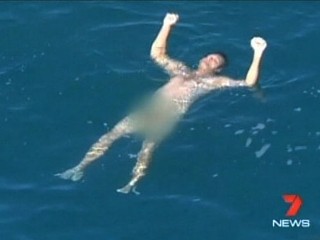 Watch: Shark Circles Naked Man Fighting for His Life