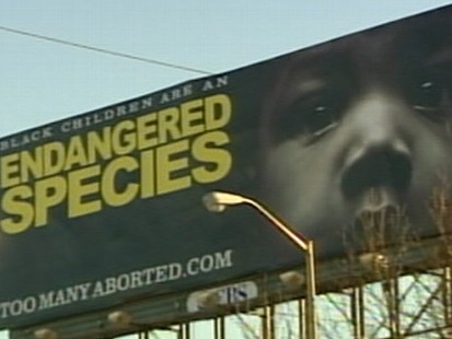 VIDEO: The signs combine the contentious issues of race and abortion in Atlanta.