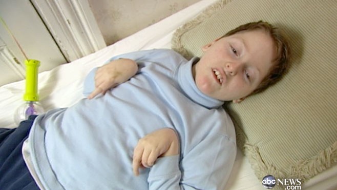 VIDEO: High school football player a reluctant hero helping disabled boy.