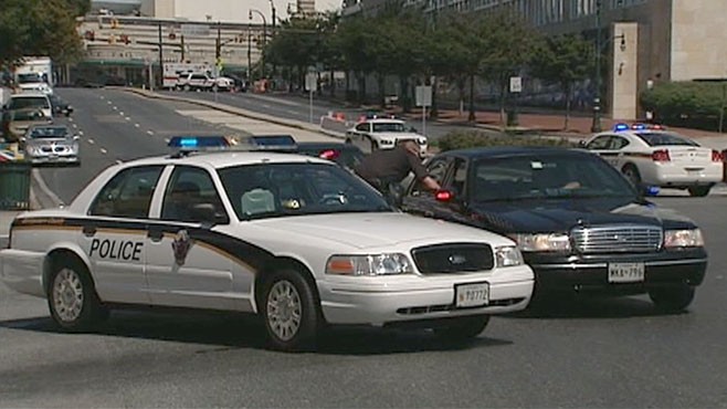VIDEO: An armed man was shot dead after taking hostages at Discovery's headquarters.