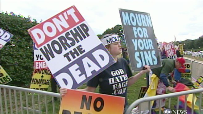 VIDEO: Demonstrators line up outside the church for tomorrow?s ceremony.