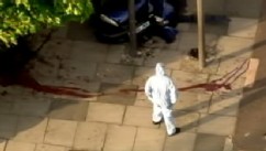 VIDEO: Alleged attacker talks on video after attack, knives in hands.