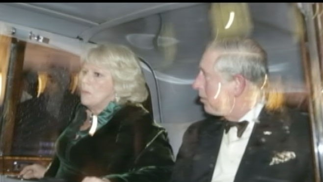 VIDEO: Royal security breach: couple surrounded during college tuition protest.