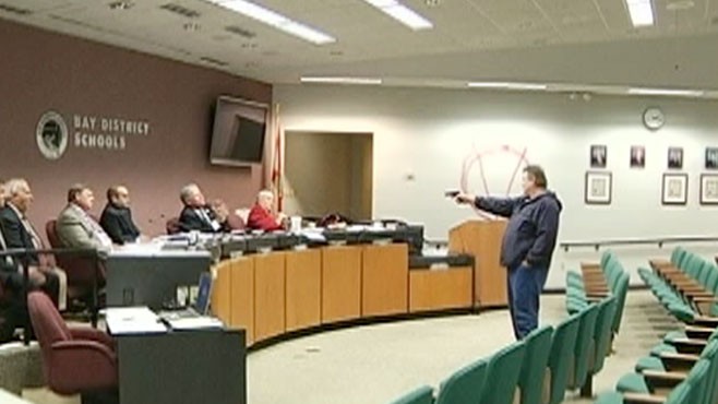 VIDEO: A Florida man upset that his wife was fired opened fire on the school board.