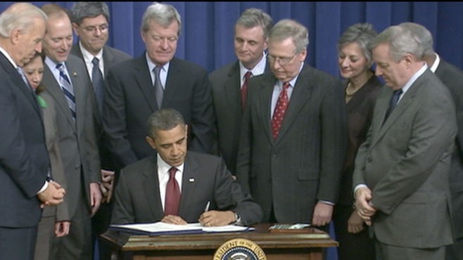 VIDEO: Taking a move from the previous president?s playbook, Obama signs tax law.