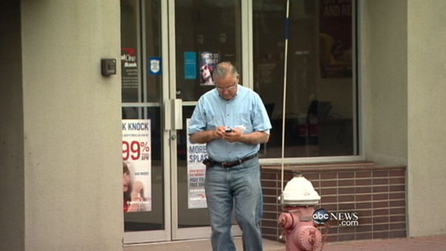 VIDEO: Distracted pedestrians lead to law enforcement crackdowns.