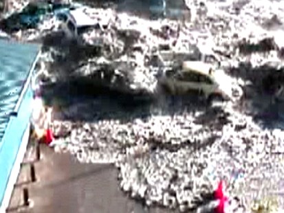 VIDEO: Menacing Tsunami Waves Toss Cars Like Toys
