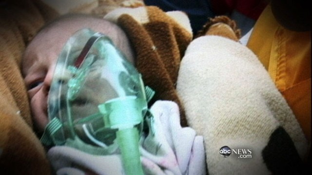 VIDEO: Rescuers save an infant girl from the rubble of an apartment building.