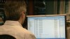 VIDEO: Companies inboxes across the globe are jammed with virus-attached emails.