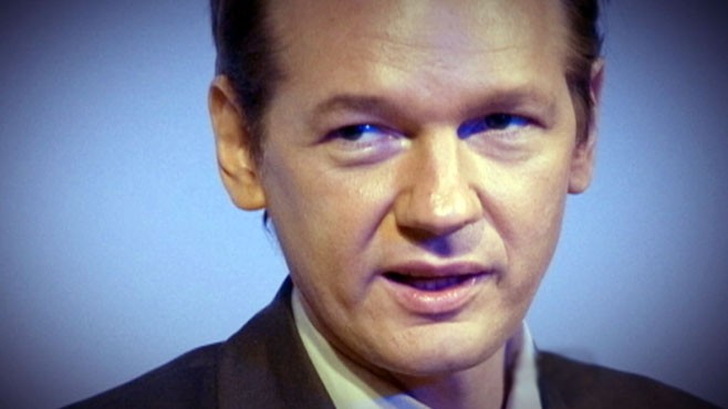VIDEO: The website's founder surrendered to police in London.