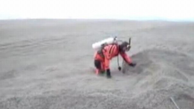 VIDEO: Watch as divers venture into an ash-filled lake in Argentina