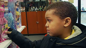 PHOTO An episode of "What Would You Do" explores what on-lookers would do when presented with a father struggling with the thought of buying a doll for his son.