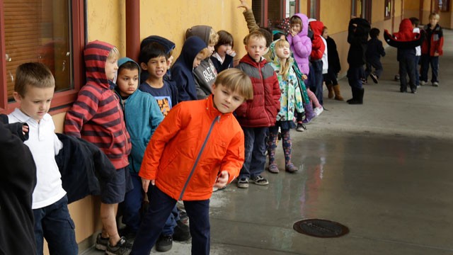 PHOTO: A first grade class of 30 children waits to enter a classroom Thursday, Jan. 24, 2013, at the Willow Glenn Elementary School in San Jose, Calif.