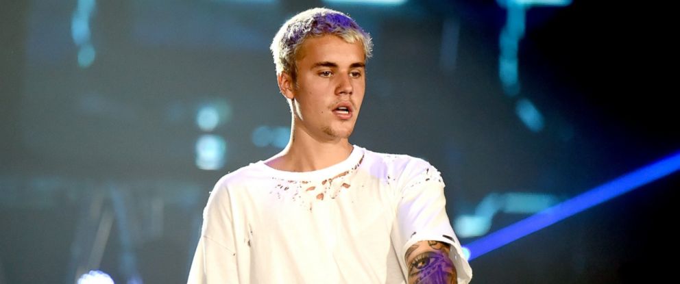 Justin Bieber Tells Concertgoers Stop Throwing Gifts Onstage, 'I ...