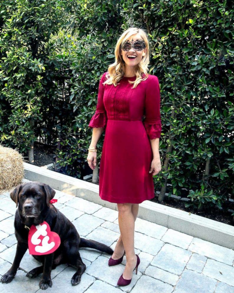 PHOTO: Reese Witherspoon alongside her chocolate lab dressed as a TY Beanie Baby.