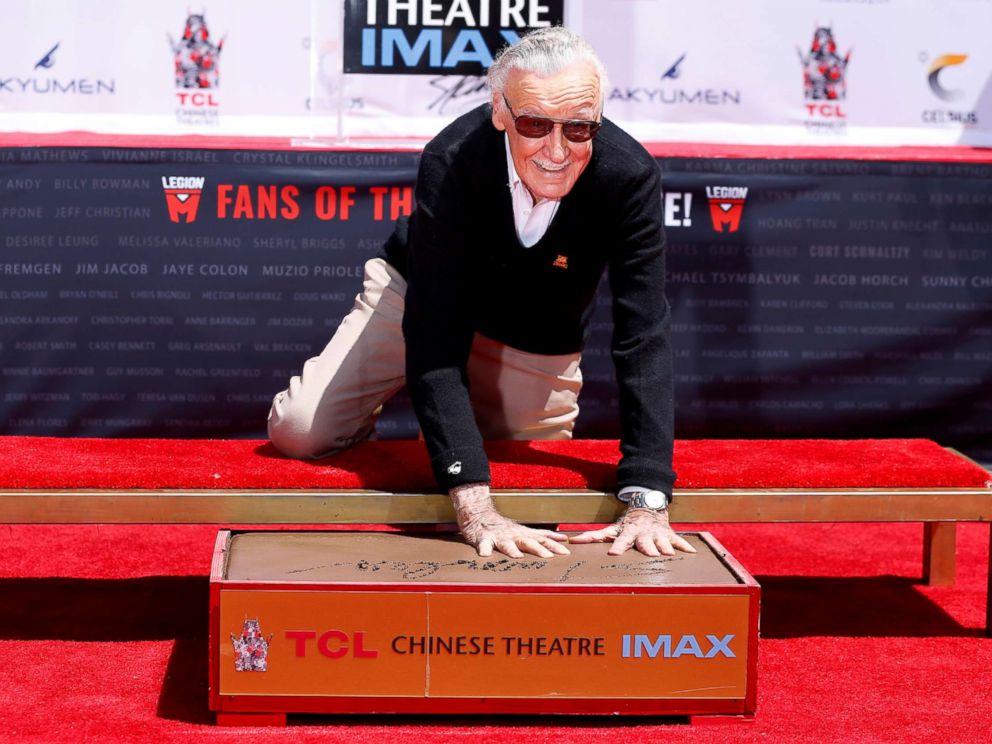 PHOTO: Marvel Comics co-creator Stan Lee places his handprints in cement during a ceremony at the TCL Chinese theatre in Los Angeles, July 18, 2017.