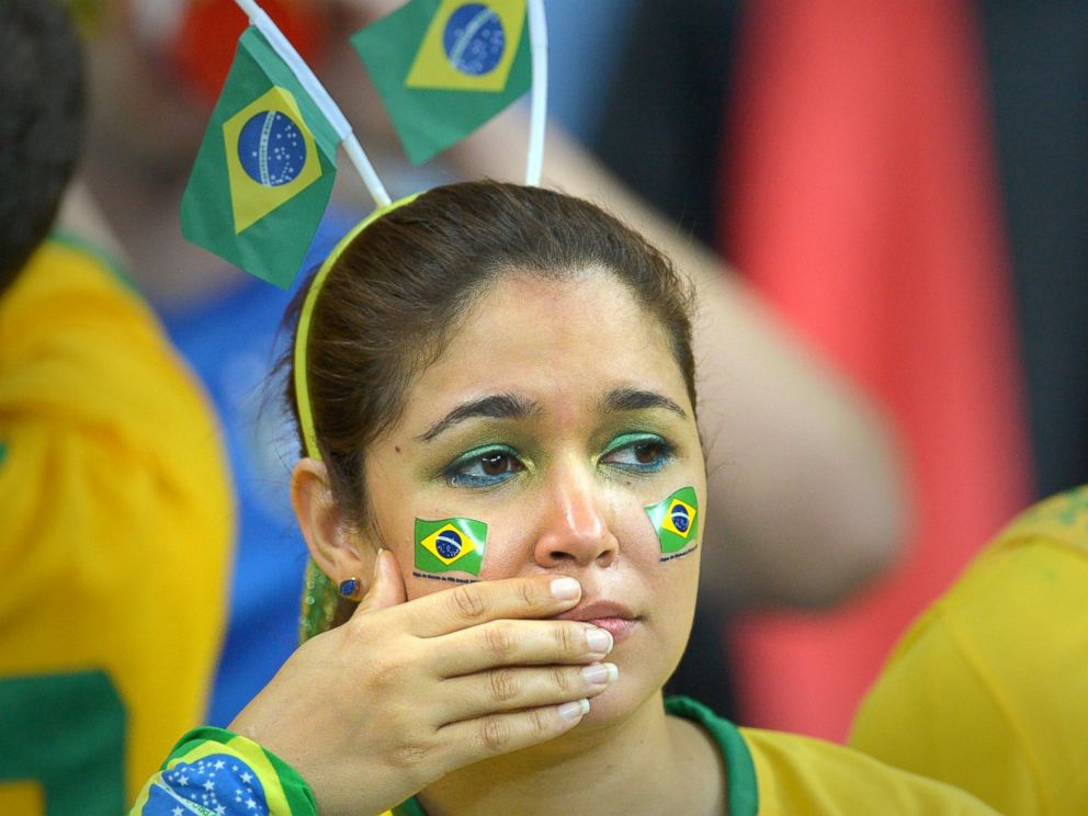 PHOTO: A supporter of Brazil in tears is pictured during the FIFA World Cup 2014 semi-final soccer match between Brazil and Germany at Estadio Mineirao in Belo Horizonte, Brazil on July 8, 2014. 