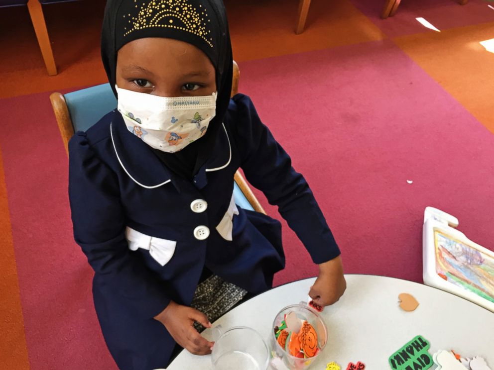 PHOTO: Amira Hassan, of Burnsville, Minn., plays in the waiting room at the specialty clinic at Childrens Minnesota in Minneapolis, May 2, 2017.