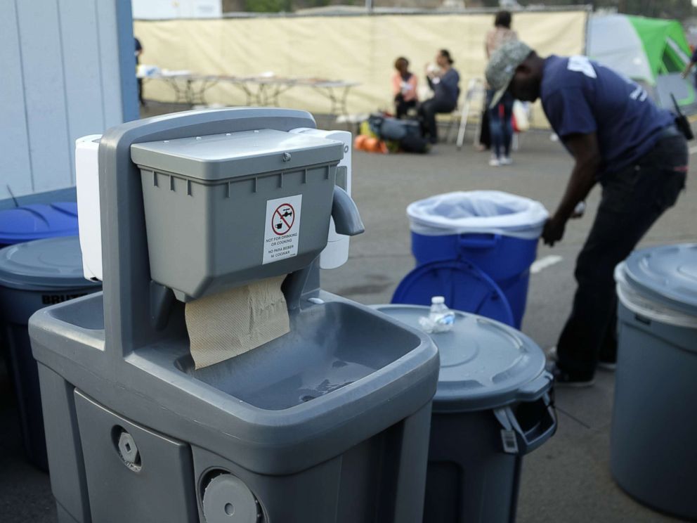 PHOTO: A hand washing station is seen near a tent city in San Diego as part of the citys efforts to combat a deadly hepatitis A outbreak, Oct. 9, 2017.