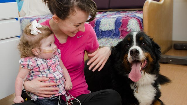 PHOTO: Madison Fleaks at the hospital with her mother, Tabitha Fleaks, and her beloved dog, Kodiak.