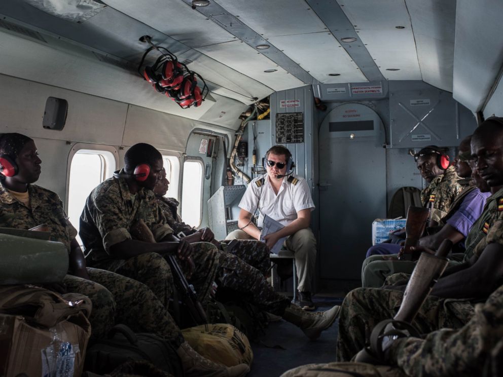 PHOTO: Members of the Uganda Peoples Defense Force (UPDF) serving in the African Union Mission in Somalia (AMISOM) travel in an United Nations helicopter on Oct. 10, 2016, departing from Mogadishu, Somalia. 