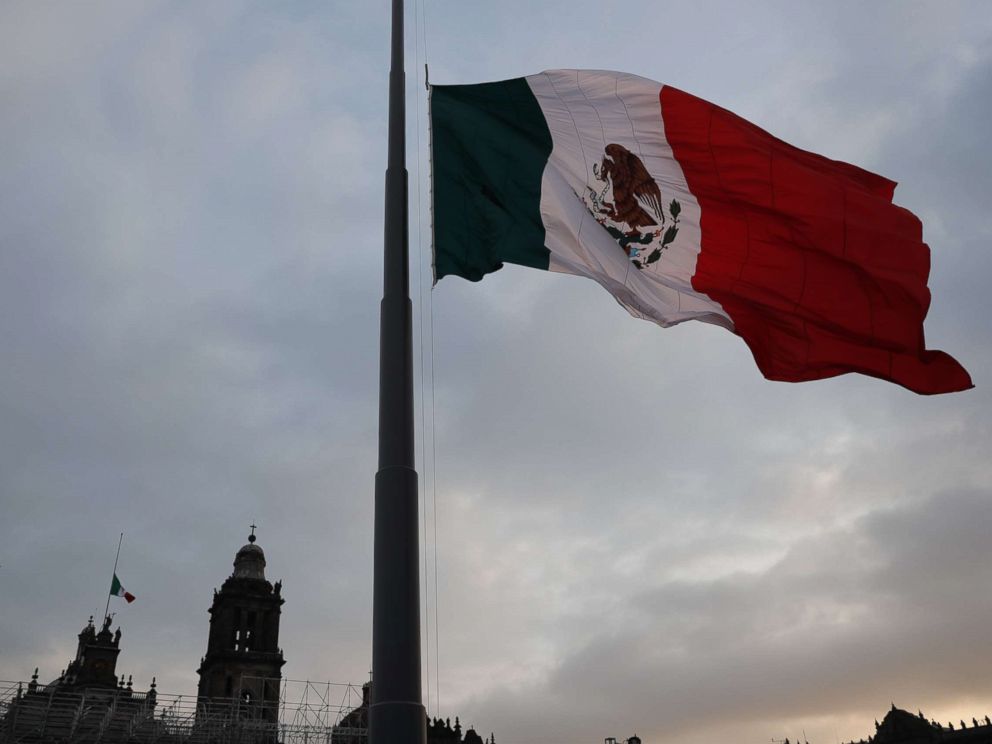 PHOTO: The Mexican flag flying at half mast in the Constitution Square to commemorate the 32nd anniversary of the 8.0 earthquake that occurred on September 19, 1985, in Mexico City, Mexico. 