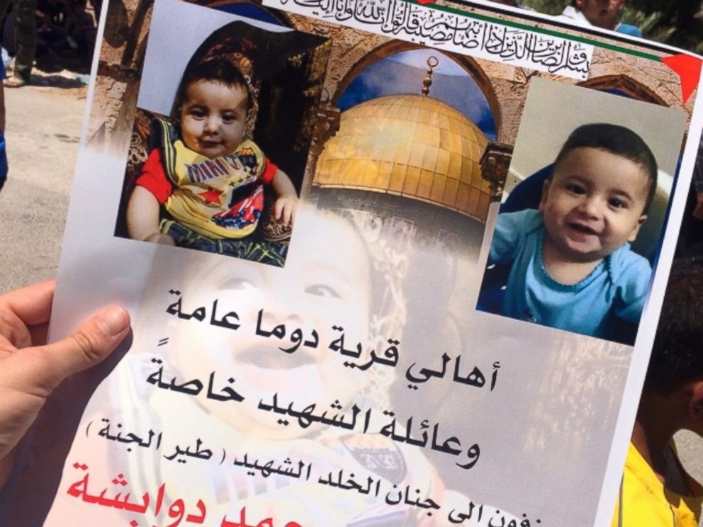 PHOTO: Within hours of his death, posters with 18 month year-old Ali Dawabsheh’s face were printed and passed out ahead of Friday’s funeral.
