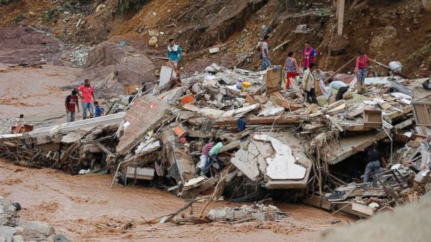 Desperate search for survivors of Colombia flood; more than 200 dead
